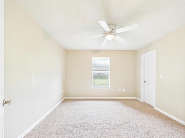5261 Moore Loop, Crestview, FL 32536 - unfurnished room with light carpet and a ceiling fan