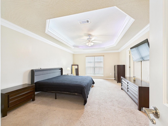 5261 Moore Loop, Crestview, FL 32536 - carpeted bedroom featuring a raised ceiling, ornamental molding, and a ceiling fan