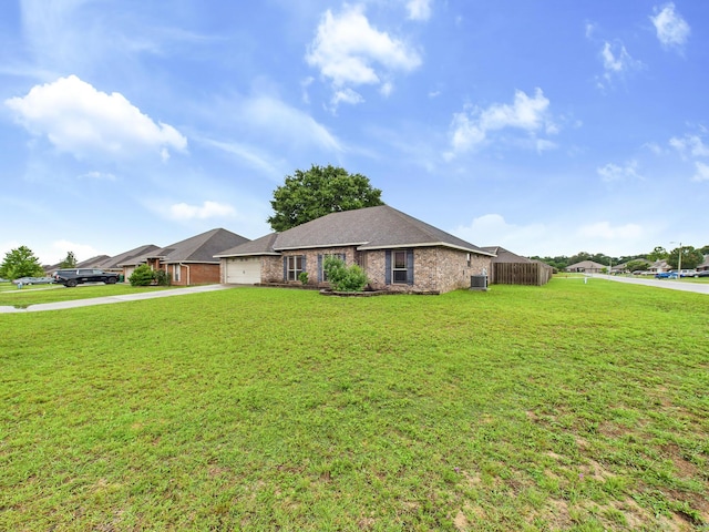 5261 Moore Loop, Crestview, FL 32536 - ranch-style home featuring concrete driveway, a garage, a front lawn, and brick siding