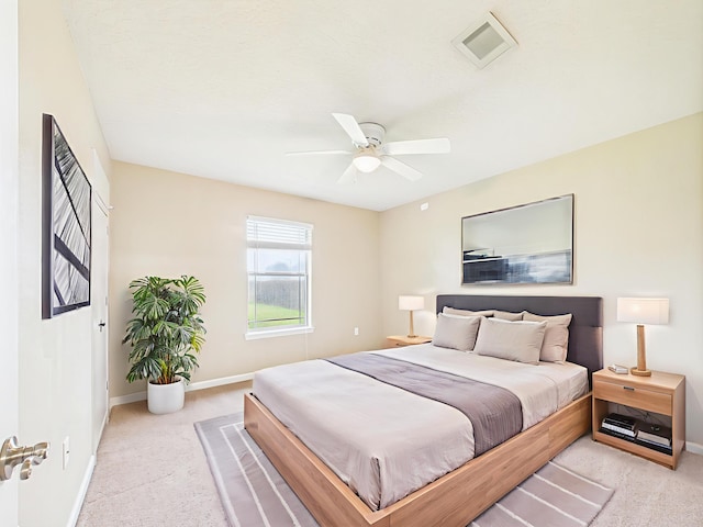5261 Moore Loop, Crestview, FL 32536 - bedroom featuring light colored carpet and ceiling fan
