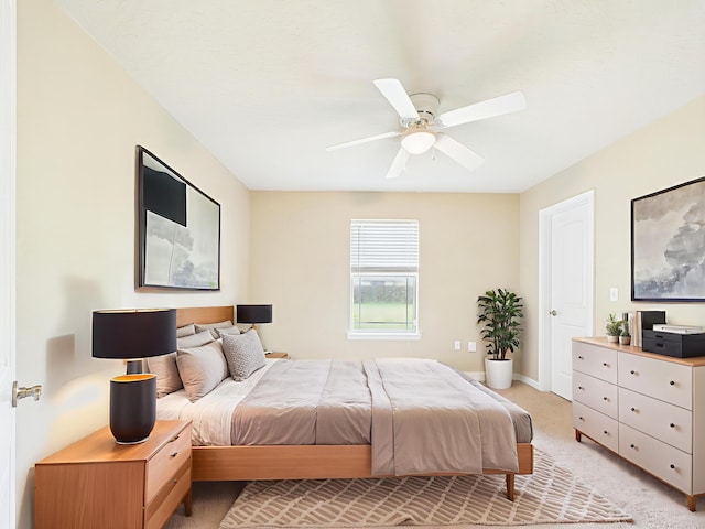 5261 Moore Loop, Crestview, FL 32536 - bedroom with light colored carpet and ceiling fan