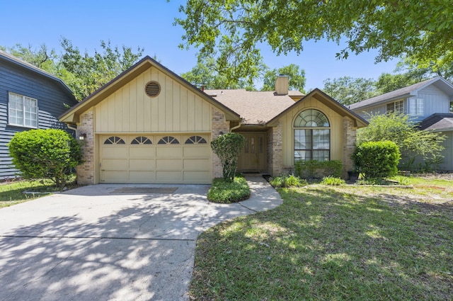 1405 Ariel Ln, Fort Walton Beach, FL 32547 - ranch-style house with concrete driveway, brick siding, a chimney, a garage, and a front yard