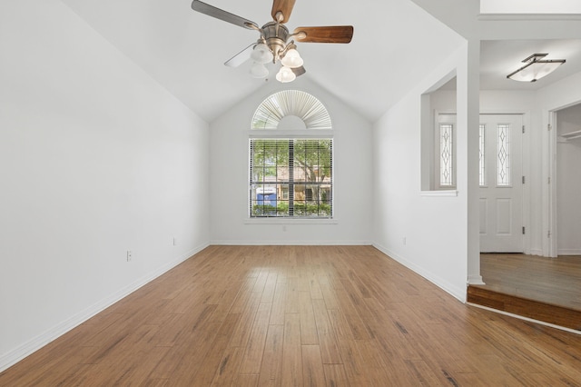 1405 Ariel Ln, Fort Walton Beach, FL 32547 - spare room featuring wood finished floors, ceiling fan, lofted ceiling, and baseboards