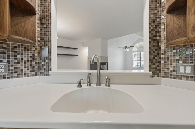 1405 Ariel Ln, Fort Walton Beach, FL 32547 - detailed view of a sink, ceiling fan, backsplash, and light countertops
