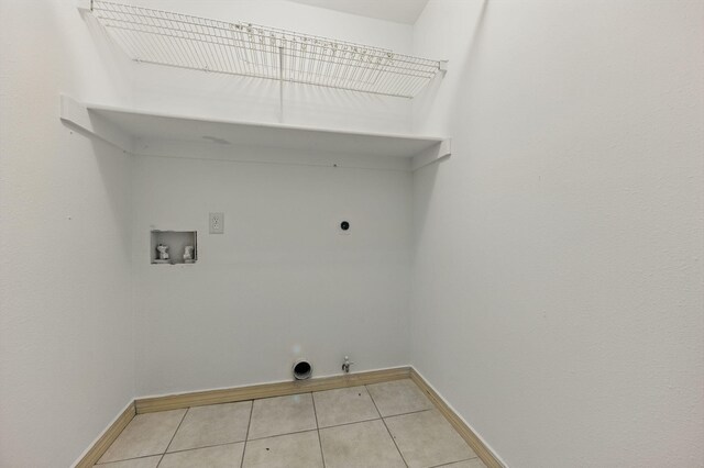 1405 Ariel Ln, Fort Walton Beach, FL 32547 - clothes washing area featuring electric dryer hookup, hookup for a washing machine, hookup for a gas dryer, and baseboards