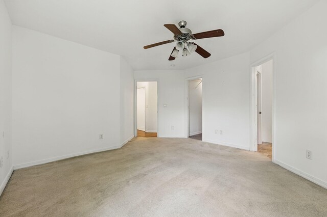 1405 Ariel Ln, Fort Walton Beach, FL 32547 - empty room featuring light carpet, ceiling fan, and baseboards