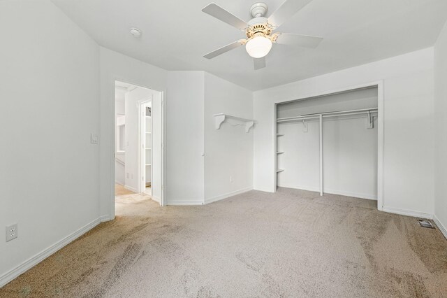 1405 Ariel Ln, Fort Walton Beach, FL 32547 - unfurnished bedroom with carpet flooring, baseboards, a closet, and a ceiling fan
