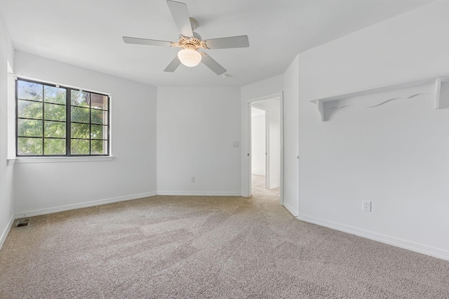 1405 Ariel Ln, Fort Walton Beach, FL 32547 - unfurnished room with a ceiling fan, carpet, and baseboards