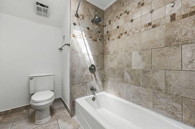 1405 Ariel Ln, Fort Walton Beach, FL 32547 - bathroom featuring toilet, shower / tub combination, and baseboards