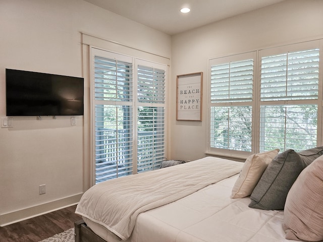 10 Gulfview Way, Santa Rosa Beach, FL 32459 - bedroom featuring wood finished floors, multiple windows, baseboards, and recessed lighting
