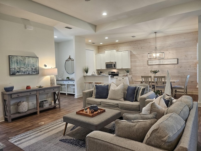10 Gulfview Way, Santa Rosa Beach, FL 32459 - living room featuring recessed lighting, baseboards, dark wood-type flooring, and wood walls