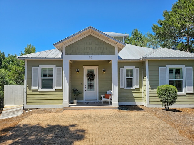 10 Gulfview Way, Santa Rosa Beach, FL 32459 - bungalow-style house with metal roof and a porch