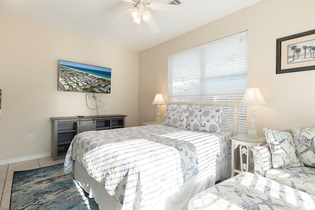 77 Mark St, Destin, FL 32541 - bedroom featuring tile patterned floors, baseboards, and a ceiling fan