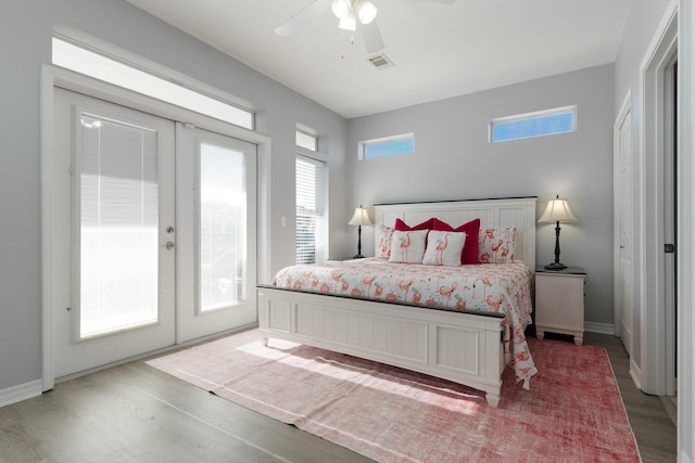 77 Mark St, Destin, FL 32541 - bedroom with french doors, access to exterior, wood finished floors, and baseboards