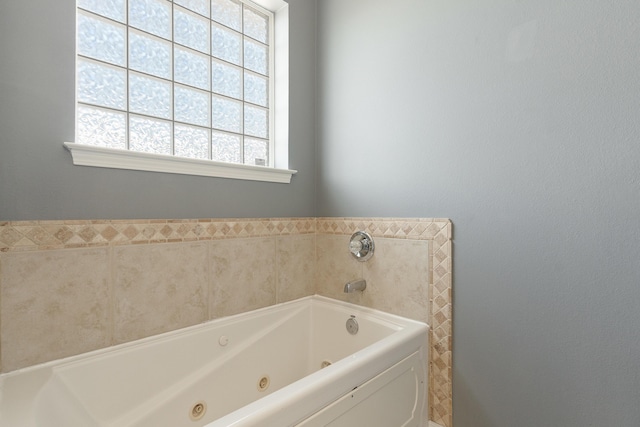 77 Mark St, Destin, FL 32541 - bathroom featuring a tub with jets