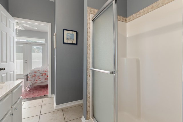 77 Mark St, Destin, FL 32541 - full bath featuring ceiling fan, a shower stall, connected bathroom, tile patterned flooring, and vanity