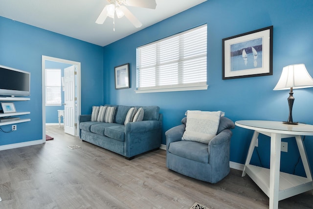77 Mark St, Destin, FL 32541 - living room with plenty of natural light, ceiling fan, and wood finished floors