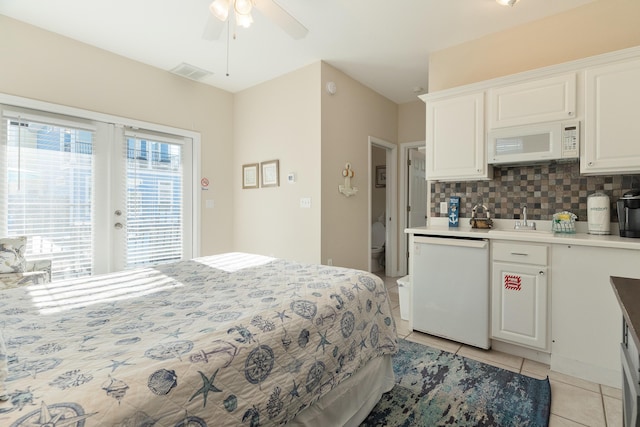 77 Mark St, Destin, FL 32541 - bedroom with access to outside, light tile patterned floors, a sink, and a ceiling fan