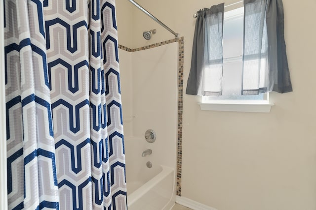 77 Mark St, Destin, FL 32541 - full bathroom with healthy amount of natural light, shower / bath combo, and baseboards