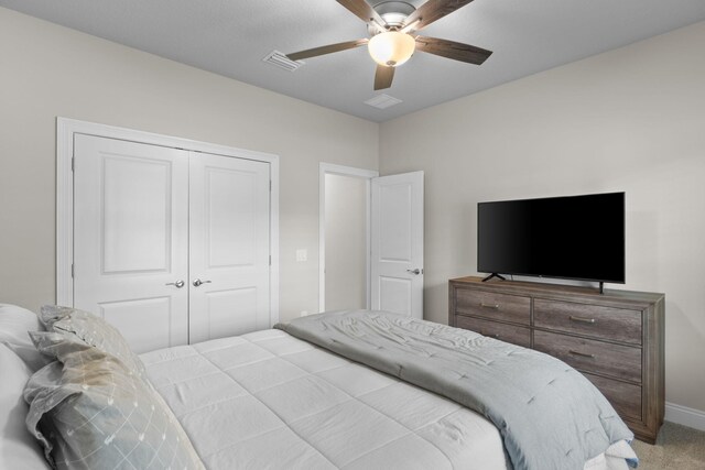 5414 Harmony Ln, Gulf Breeze, FL 32563 - bedroom with a closet, carpet floors, ceiling fan, and baseboards