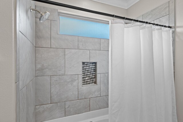 5414 Harmony Ln, Gulf Breeze, FL 32563 - bathroom featuring shower / bath combo with shower curtain and ornamental molding