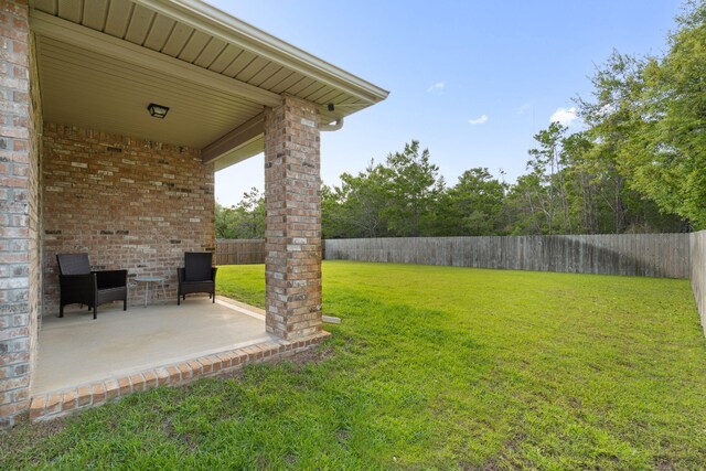 5414 Harmony Ln, Gulf Breeze, FL 32563 - view of yard featuring a patio