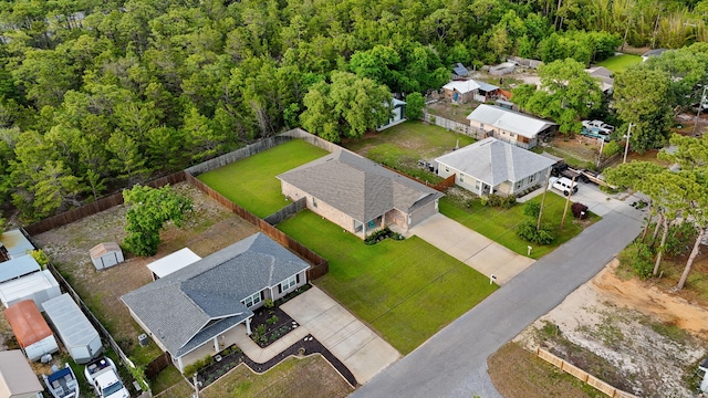 5414 Harmony Ln, Gulf Breeze, FL 32563 - aerial view of residential area featuring a heavily wooded area