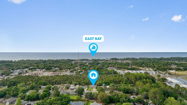 5414 Harmony Ln, Gulf Breeze, FL 32563 - aerial view of a large body of water and a tree filled landscape