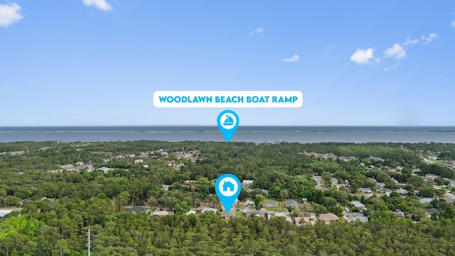 5414 Harmony Ln, Gulf Breeze, FL 32563 - aerial view of a heavily wooded area and a large body of water