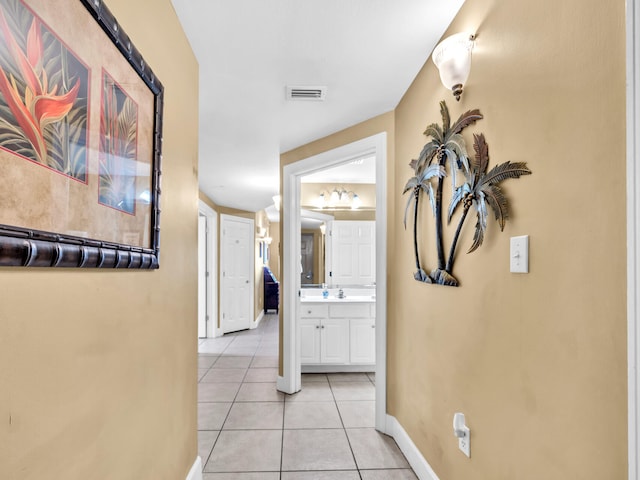 14825 Front Beach Rd Unit 1904, Panama City Beach, FL 32413 - hallway featuring light tile patterned flooring and baseboards
