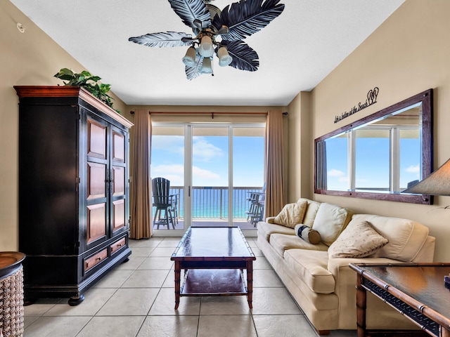 14825 Front Beach Rd Unit 1904, Panama City Beach, FL 32413 - living area with a ceiling fan, light tile patterned floors, and a water view