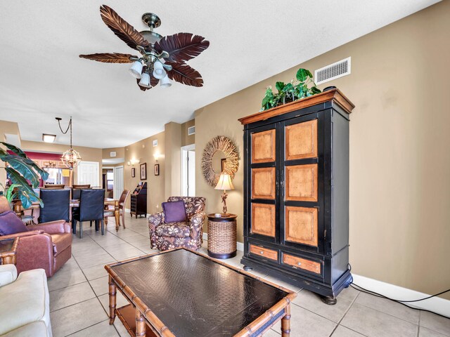 14825 Front Beach Rd Unit 1904, Panama City Beach, FL 32413 - living area featuring light tile patterned floors and a ceiling fan