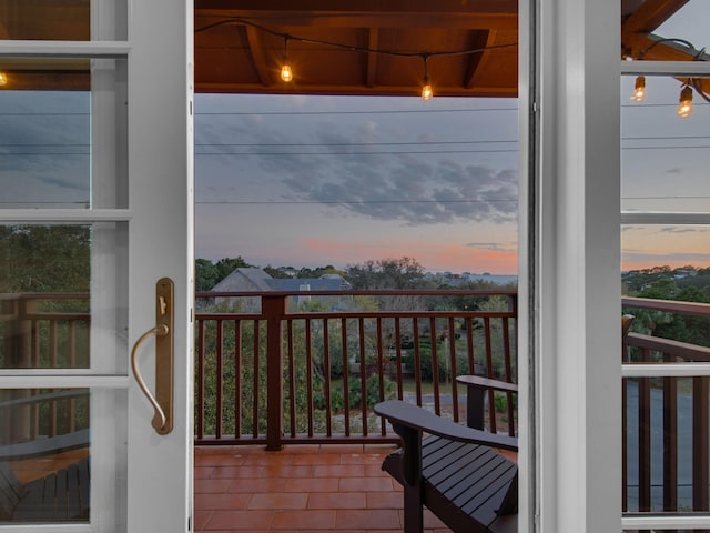 view of balcony at dusk
