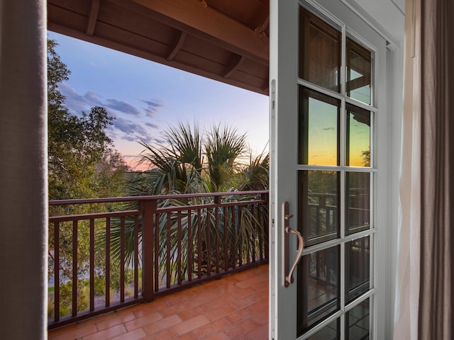 view of balcony at dusk