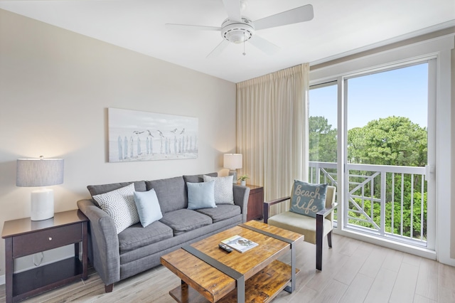 9800 Grand Sandestin Blvd Unit 5410/5412, Miramar Beach, FL 32550 - living room featuring light wood-style flooring, healthy amount of natural light, and ceiling fan