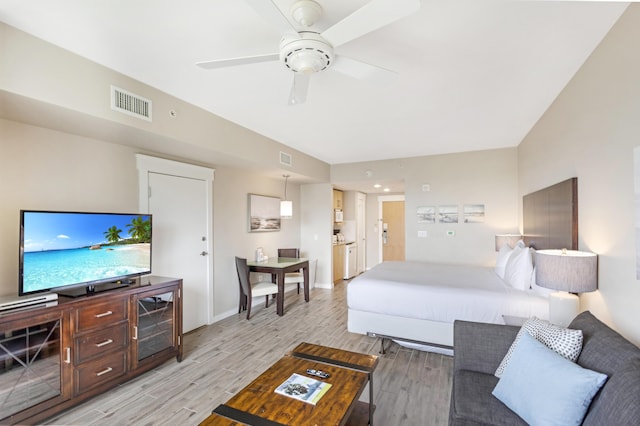 9800 Grand Sandestin Blvd Unit 5410/5412, Miramar Beach, FL 32550 - bedroom featuring light wood finished floors, baseboards, and a ceiling fan