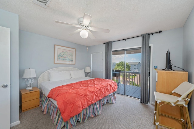 carpeted bedroom with access to exterior, baseboards, and a ceiling fan