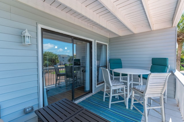deck featuring outdoor dining area