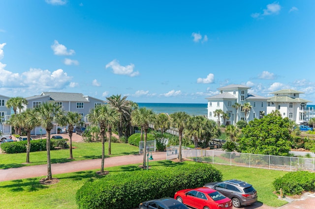view of home's community with a water view
