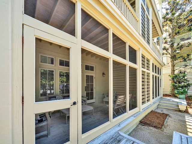entrance to property with a deck