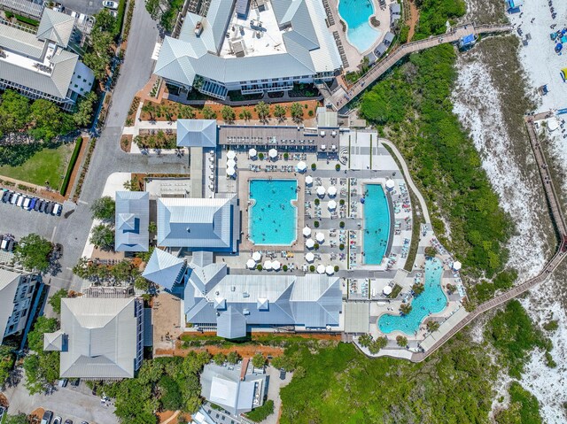 aerial view of property's location featuring a pool