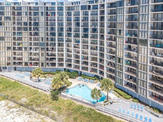 view of apartment building / complex featuring a community pool
