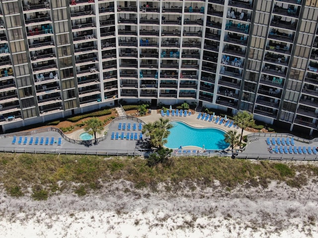 community pool featuring a patio area