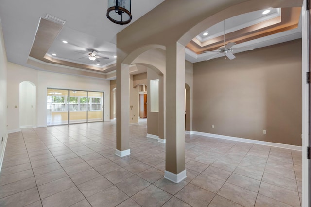 1049 Napa Way, Niceville, FL 32578 - spare room featuring a raised ceiling, a ceiling fan, arched walkways, ornamental molding, and recessed lighting