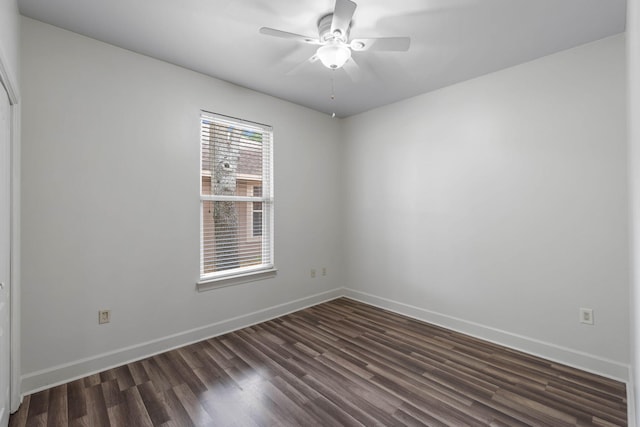 1049 Napa Way, Niceville, FL 32578 - unfurnished room with dark wood-style flooring, baseboards, and a ceiling fan
