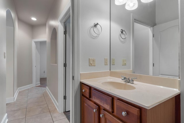 1049 Napa Way, Niceville, FL 32578 - bathroom featuring tile patterned floors, vanity, and baseboards