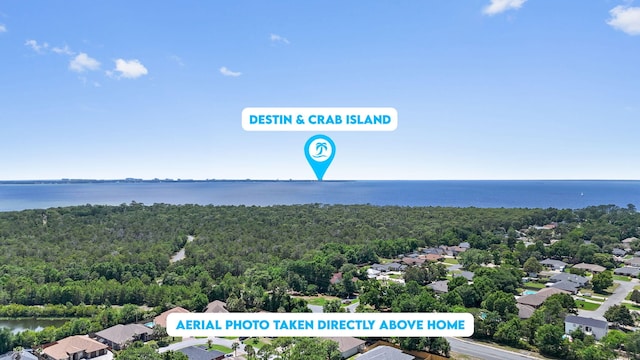 1049 Napa Way, Niceville, FL 32578 - aerial view of residential area with a nearby body of water and a heavily wooded area