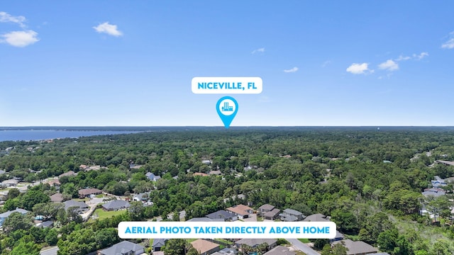 1049 Napa Way, Niceville, FL 32578 - drone / aerial view of a forest and a nearby body of water
