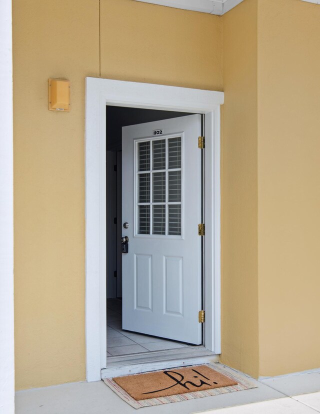 34 Herons Watch Way Unit 1102, Santa Rosa Beach, FL 32459 - view of exterior entry with stucco siding