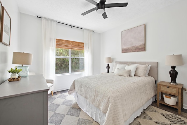 34 Herons Watch Way Unit 1102, Santa Rosa Beach, FL 32459 - bedroom with ceiling fan and a textured ceiling